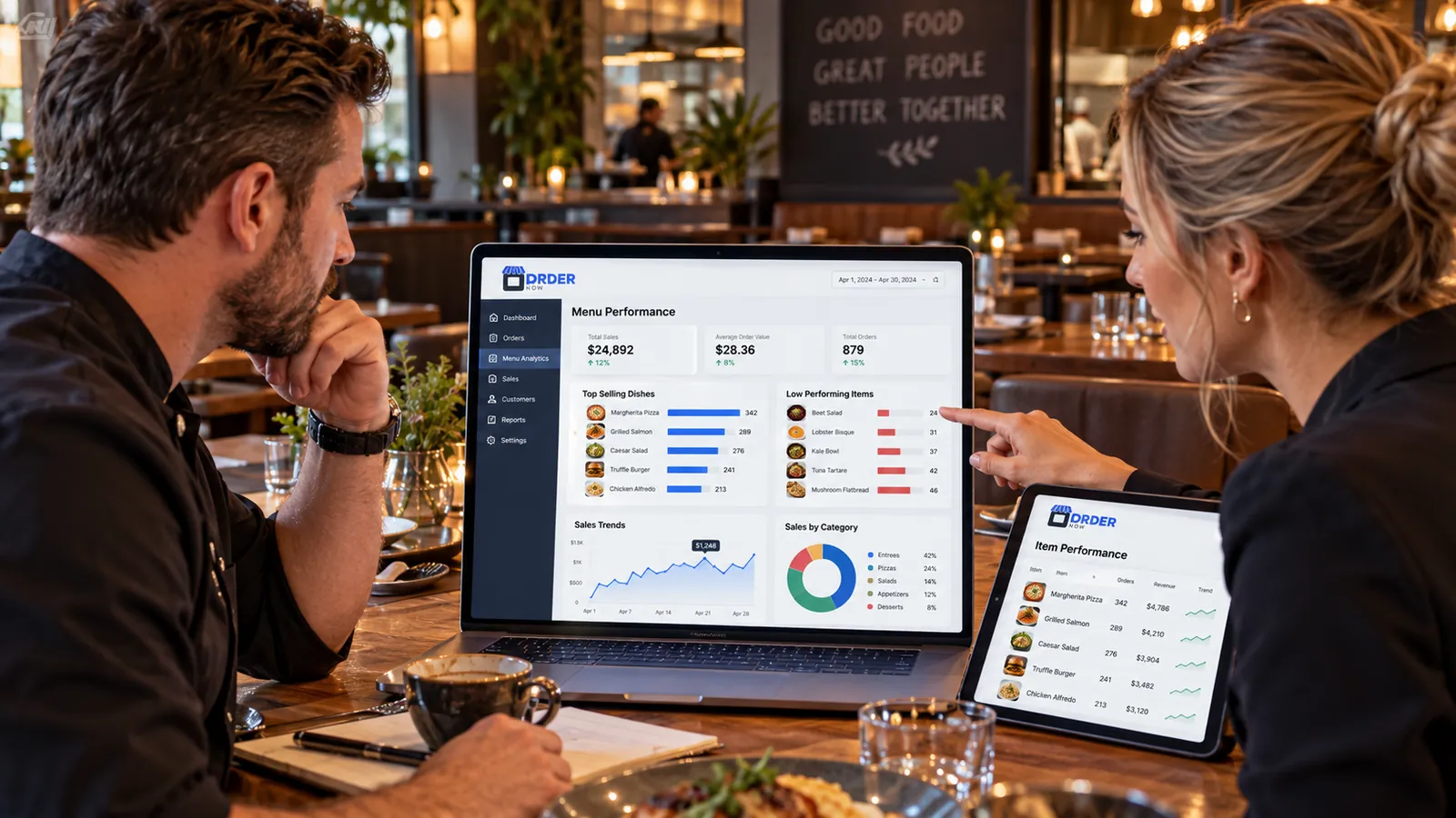 Restaurant manager and chef reviewing menu-item performance