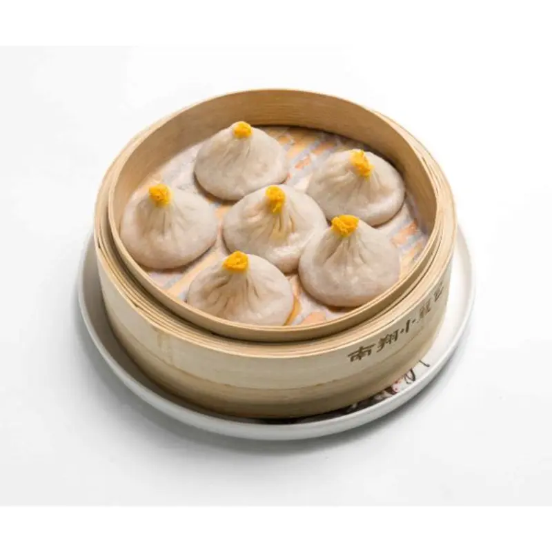 Crab Meat & Pork Soup Dumplings 蟹粉小籠包 at Nan Xiang Soup Dumplings-NY Flushing 001-Flushing NY | Toast