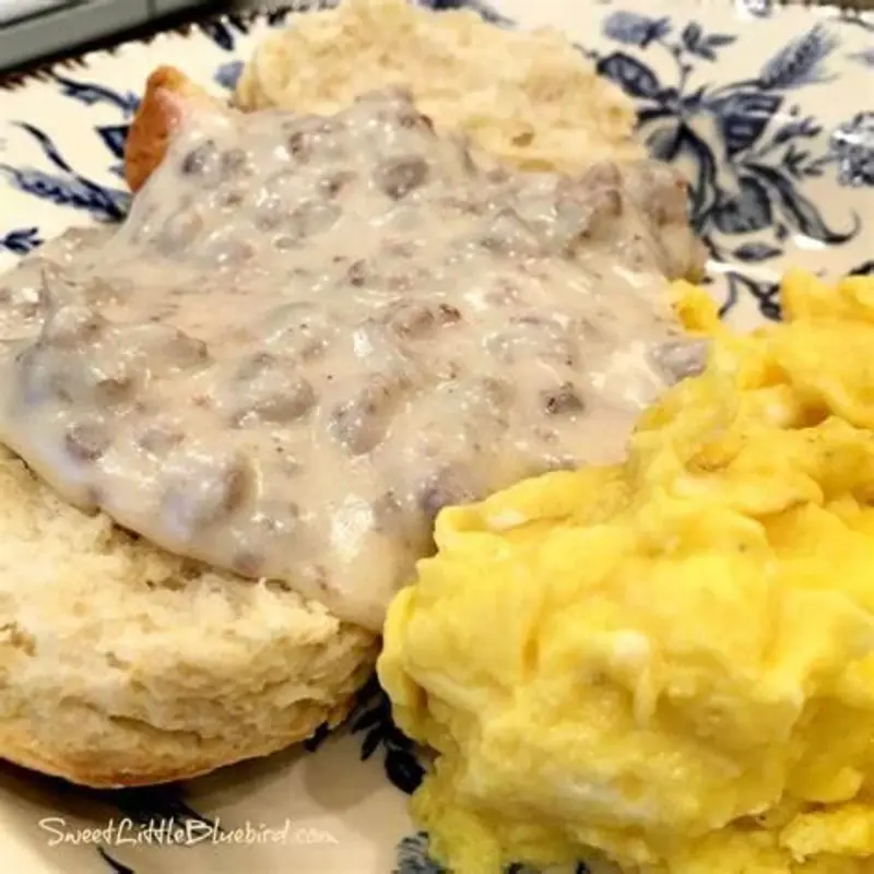 2 Eggs with biscuits & gravy with side at Edison Lunch Box