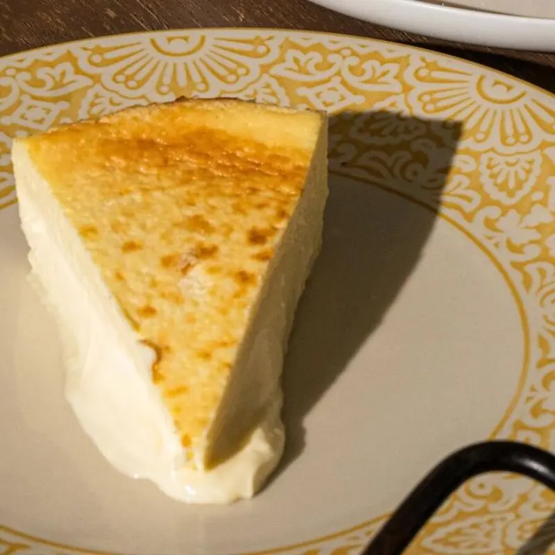 Basque Cheesecake - Slice at CalaMillor Gourmet Experience | Toast