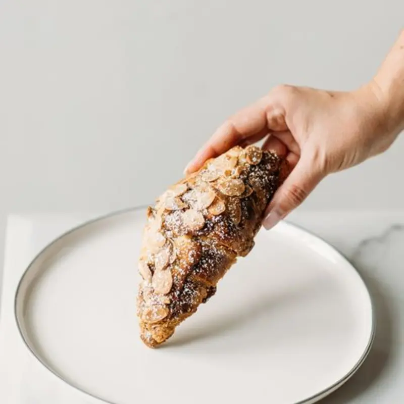 Almond Croissant Paris at Farmer's Milk 1801 N young circle | Toast