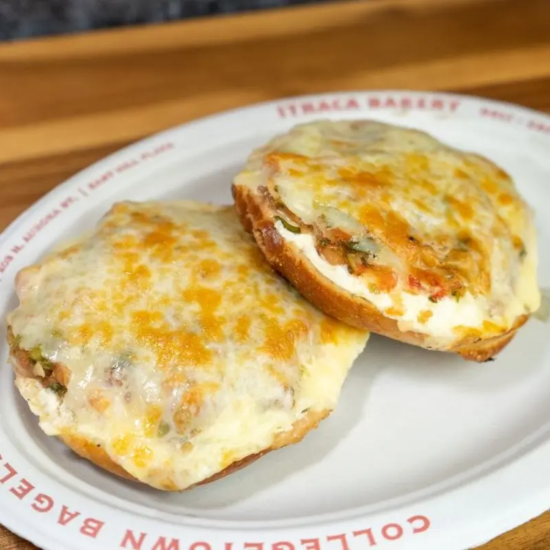 Jalapeno cream cheese, fresh salsa, and melted Cheddar cheese on a bagel at Collegetown Bagels - Syracuse 177 Marshall Street | Toast