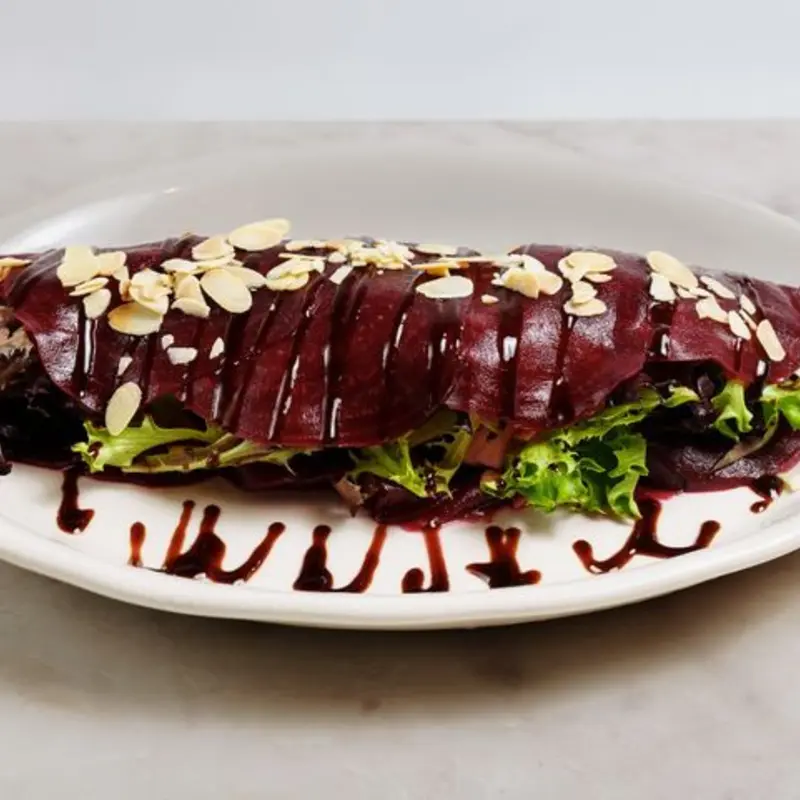 Romaine Lettuce, Goat Cheese, Apples, Roasted Almond, Beet Carpaccio with Balsamic & Olive Oil at La Boulangerie Boul'Mich Doral | Toast