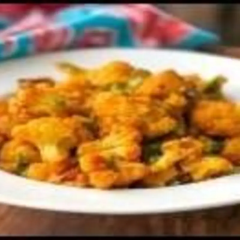 Fried cauliflower and potatoes cooked savory Indian spices sauce. Come with Rice