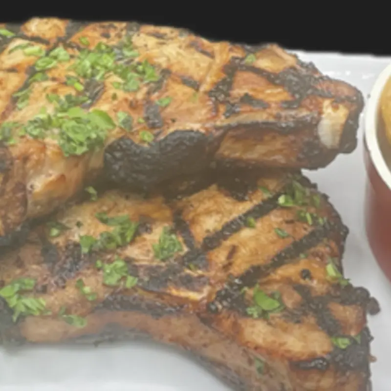 Pork Chop Dinner at Tilted Kilt Laredo #261 | Toast