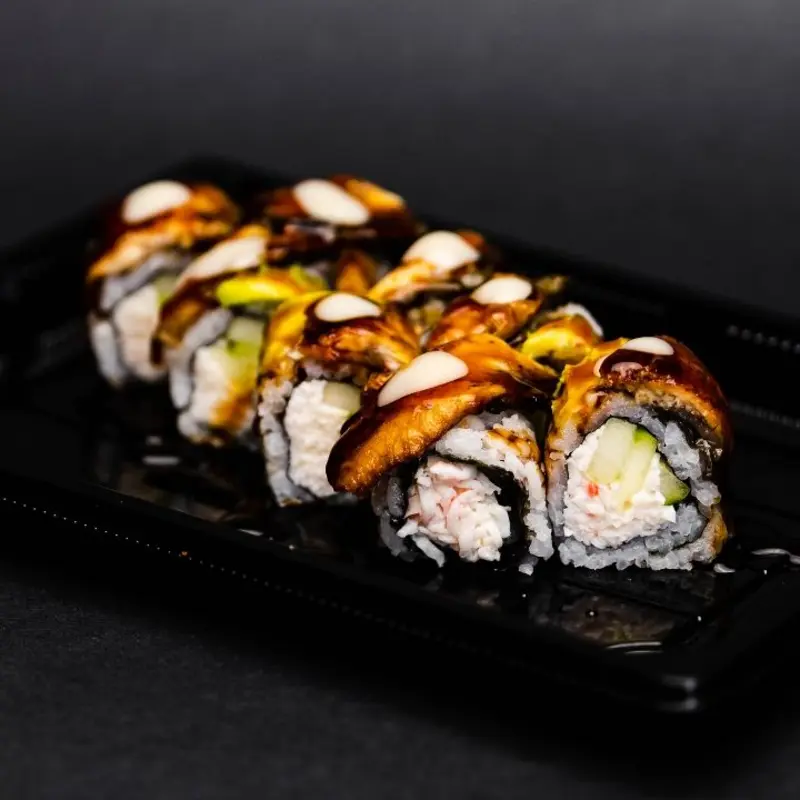 crab mix, cucumber, topped with baked fresh water eel, avocado, eel sauce, creamy soy sauce