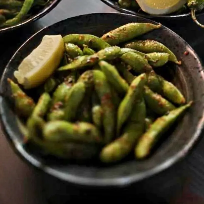 Garlic Chili Edamame at Barchi Sushi - 206 Colorado St. | Toast