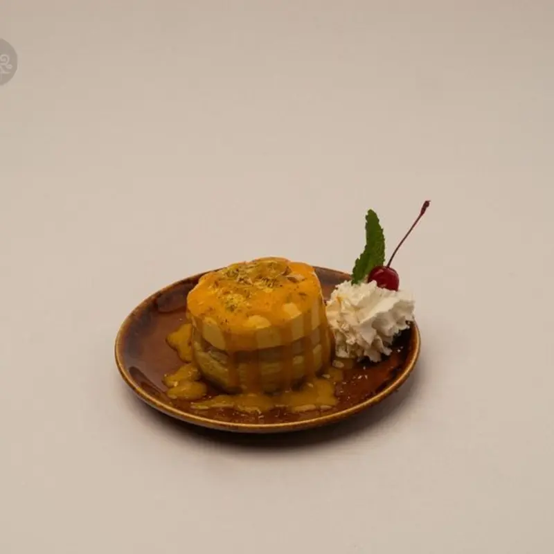Mango Cheesecake at Amrit Palace Gainesville | Toast