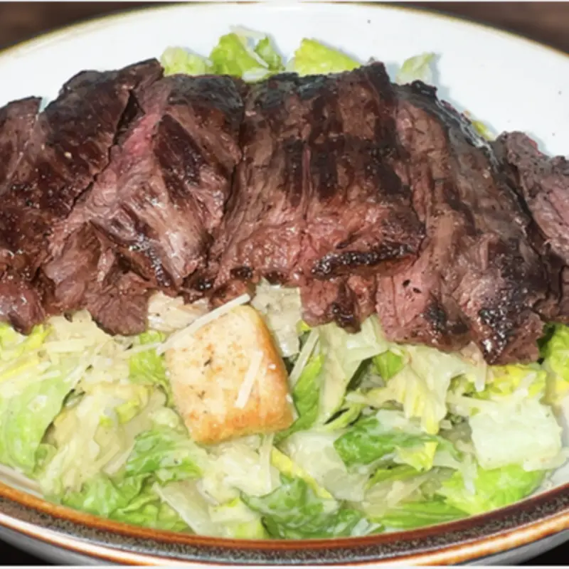 Skirt steak caesar salad at Chimiking Express 192 1550 W Vine Street | Toast