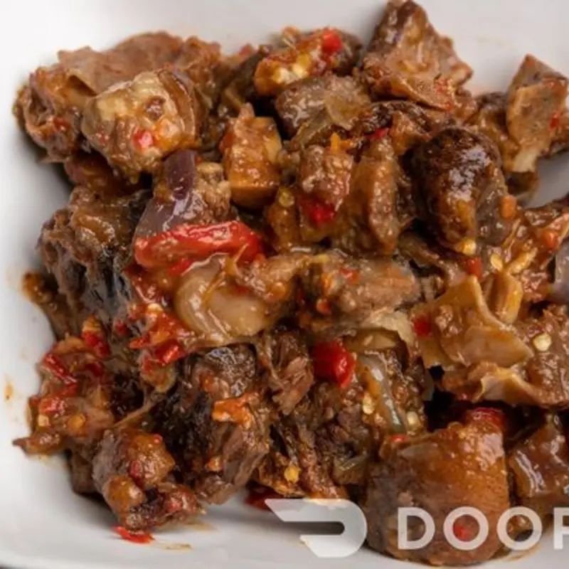 Made from diced goat meat, grilled and cooked with hot spices and onions. Enjoy alone or with any Entree of your choice. Served seperate. at Honey-Dip Fingerz | Toast