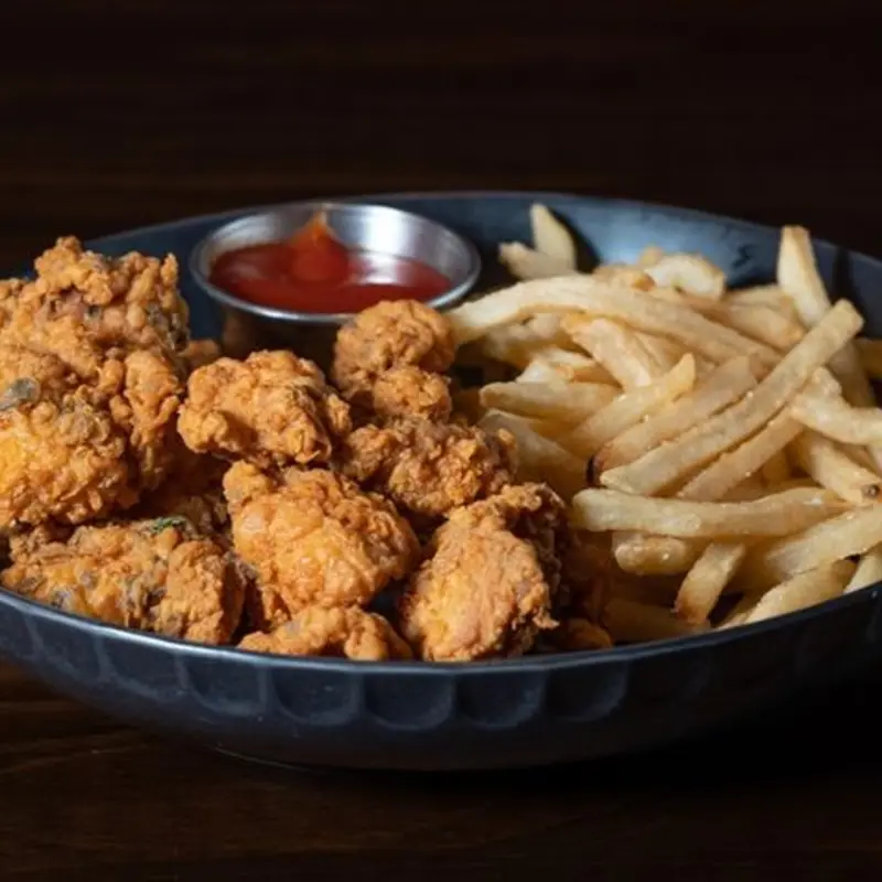 Kid's Meal: Crispy Chicken Chunks & Fries at Mamajuana Cafe | Toast