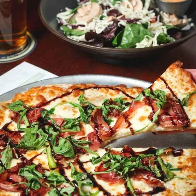 Prosciutto and Arugula 12" at Flying Saucer Houston | Toast