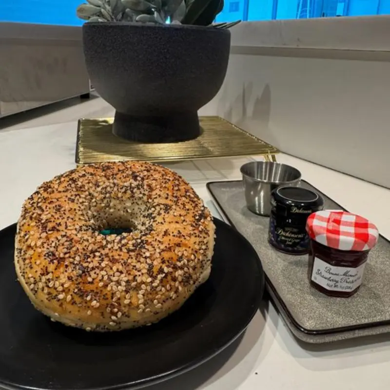 Everything Bagel with Cream Cheese at Social Sips Café & Bistro Panorama Tower - Cyber Café - 18th Floor | Toast