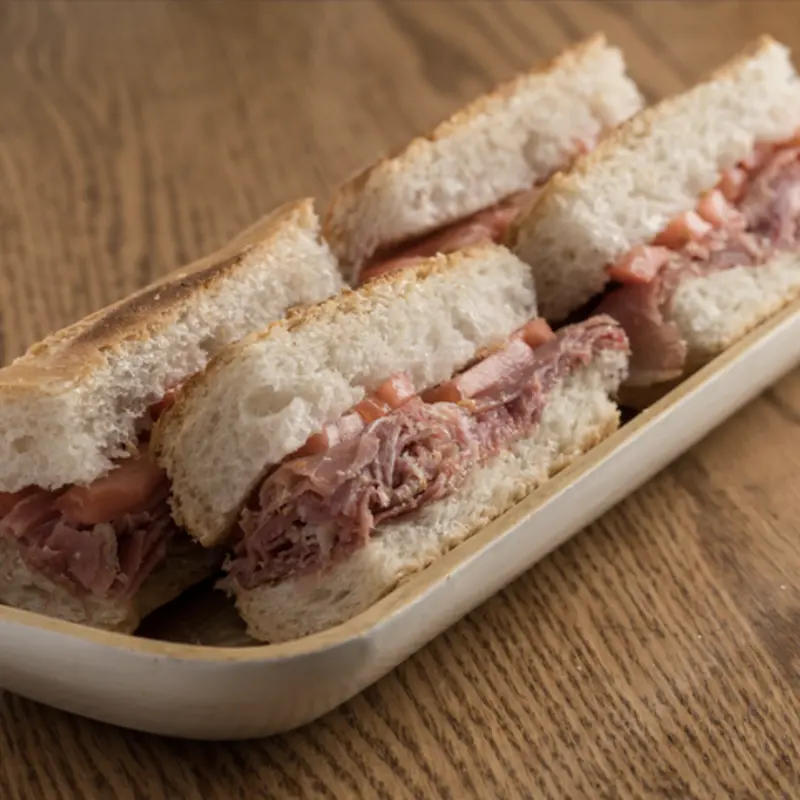 French bread, Aged Prosciutto, tomato, and olive oil. at Latin Cafe 2000 - Brickell | Toast
