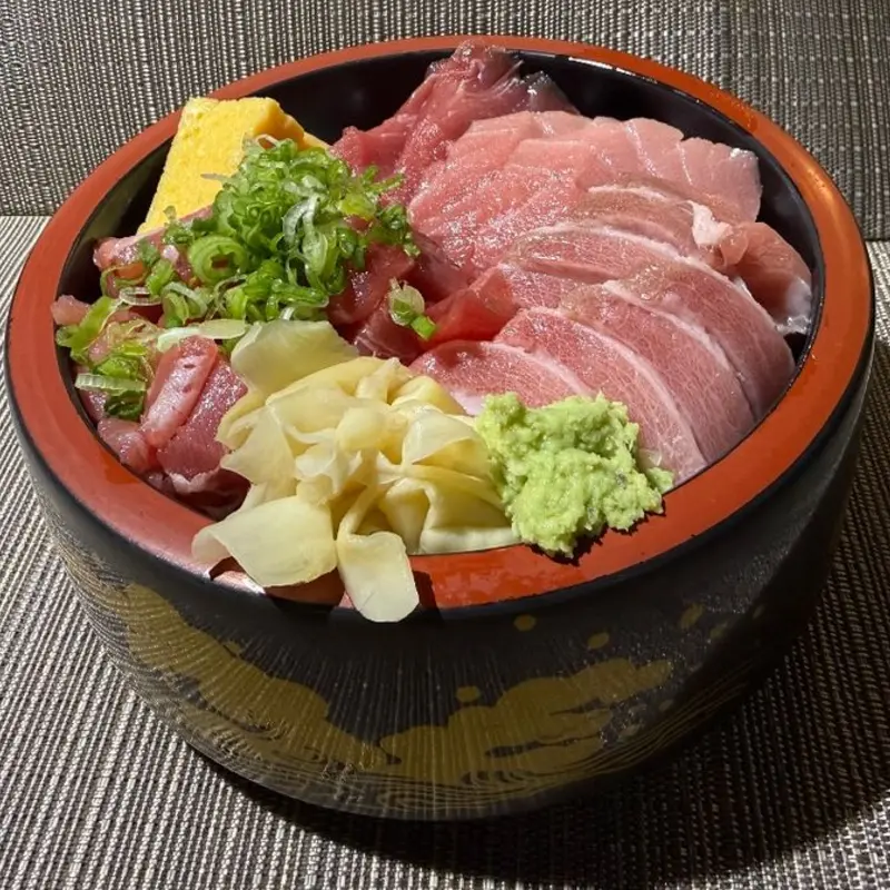 Otoro Chutoro Akami chopped Tuna with scallino over sushi rice at Momi market 1036 S Miami Ave | Toast
