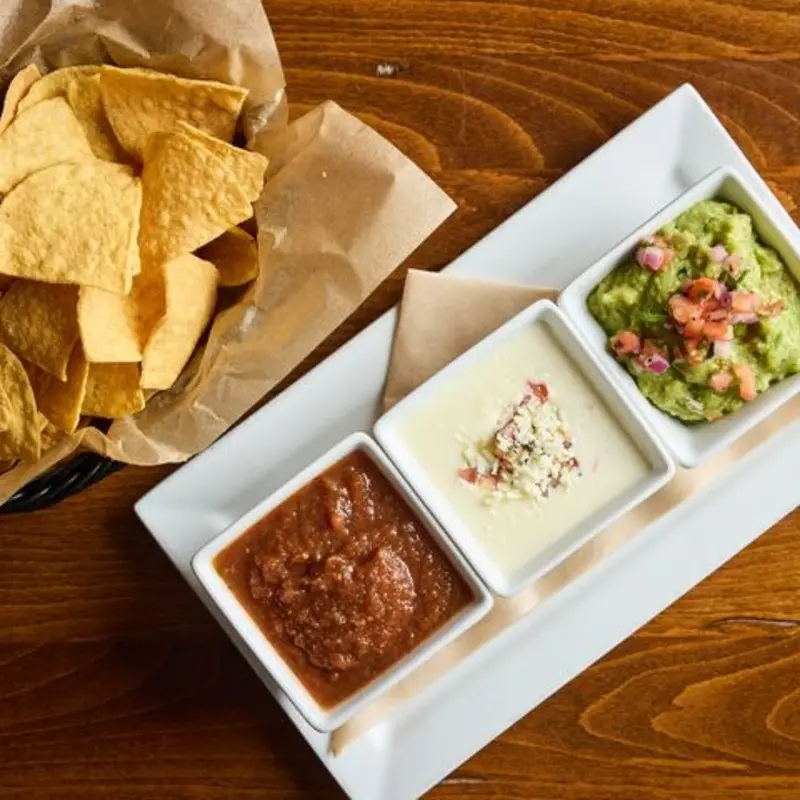 Appetizer Trio Tortilla Chips, Salsa, Guacamole, & Queso at Cedar Door Patio Bar and Grill