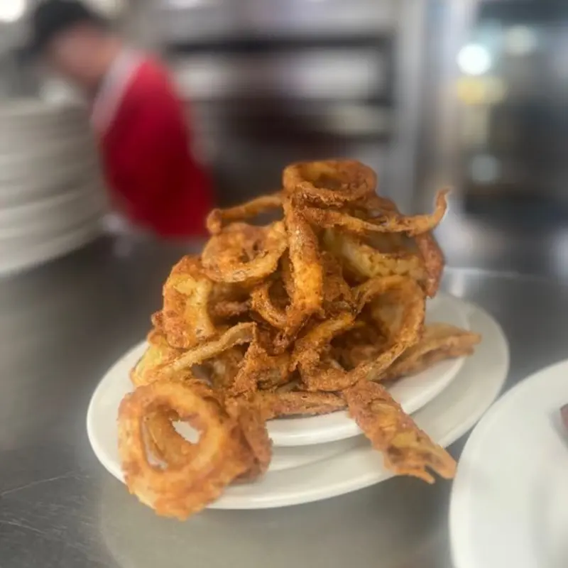FRIED OLYMPIC ONION RINGS at Hobby's Delicatessen & Restaurant