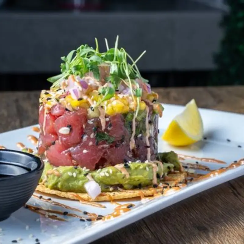 Tostada Poke Mango at CRUDA Mariscos & Oyster Bar