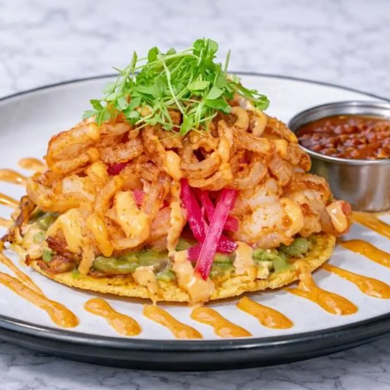 Tostada Zarandeada at CRUDA Mariscos & Oyster Bar
