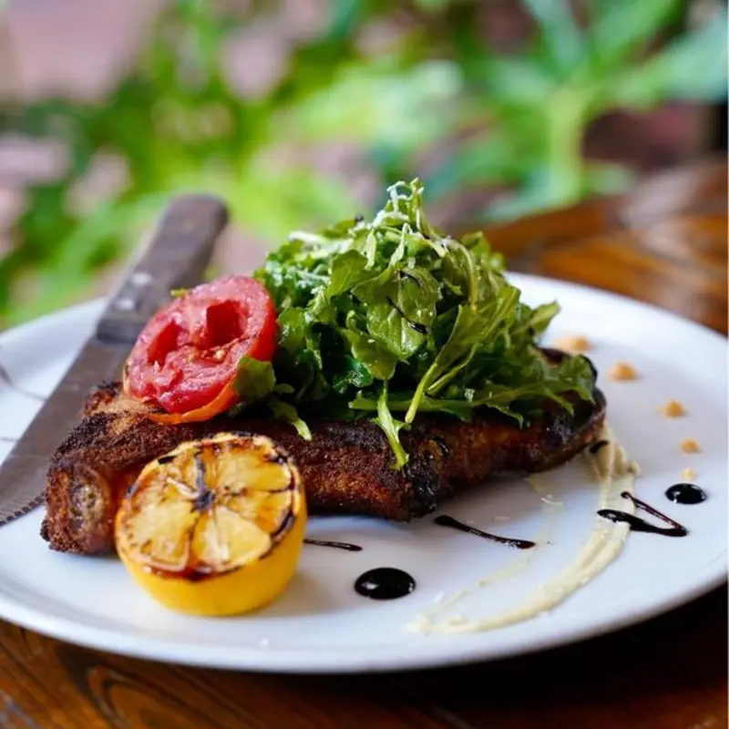 PORK CHOP MILANESE at Caragiulos Italian American Restaurant