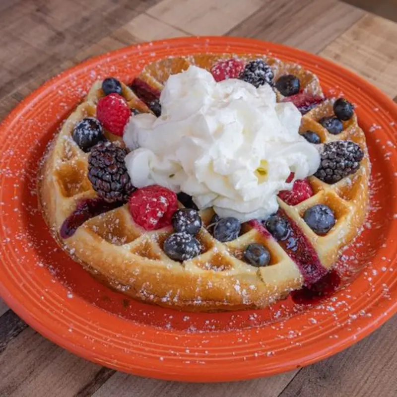 Mixed Berry Waffle at Stella's Fresh Brunch 3115 Dixie Farm Rd, Ste 117