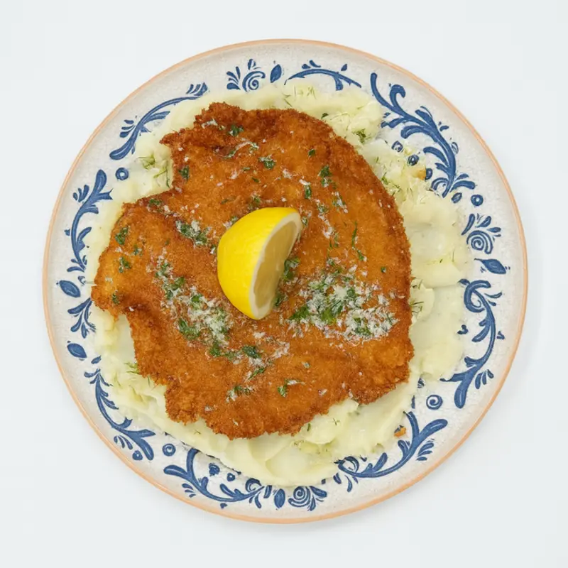 Cotoletta di Pollo alla Milanese with mashed potatoes at LeMonica 1817 N YOUNG CIRCLE
