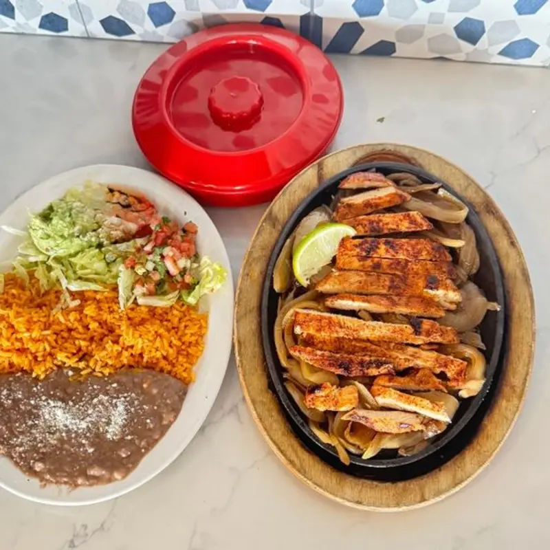 fajitas chicken at La Fondita 3969 teasley lane suite 1300