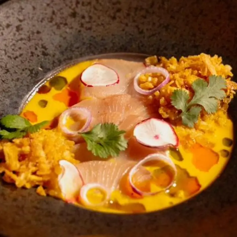 Hamachi Tiraito Aplatanao' at Bokagua restaurant 3541 Riverdale Ave