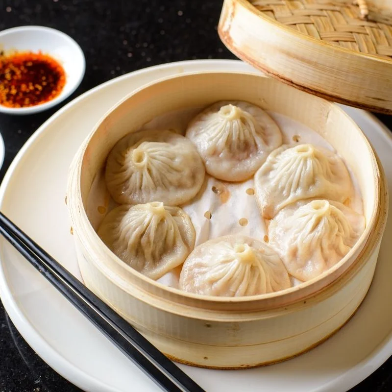 Pork Soup Dumplings 6pcs 福园小笼包 at Bund on Queens Blvd - Forest Hills