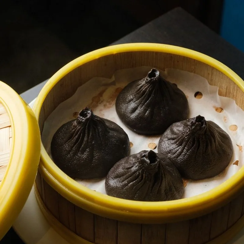 Pork Truffle Soup Dumplings 4 pcs 松露小笼包 at Bund on Queens Blvd - Forest Hills